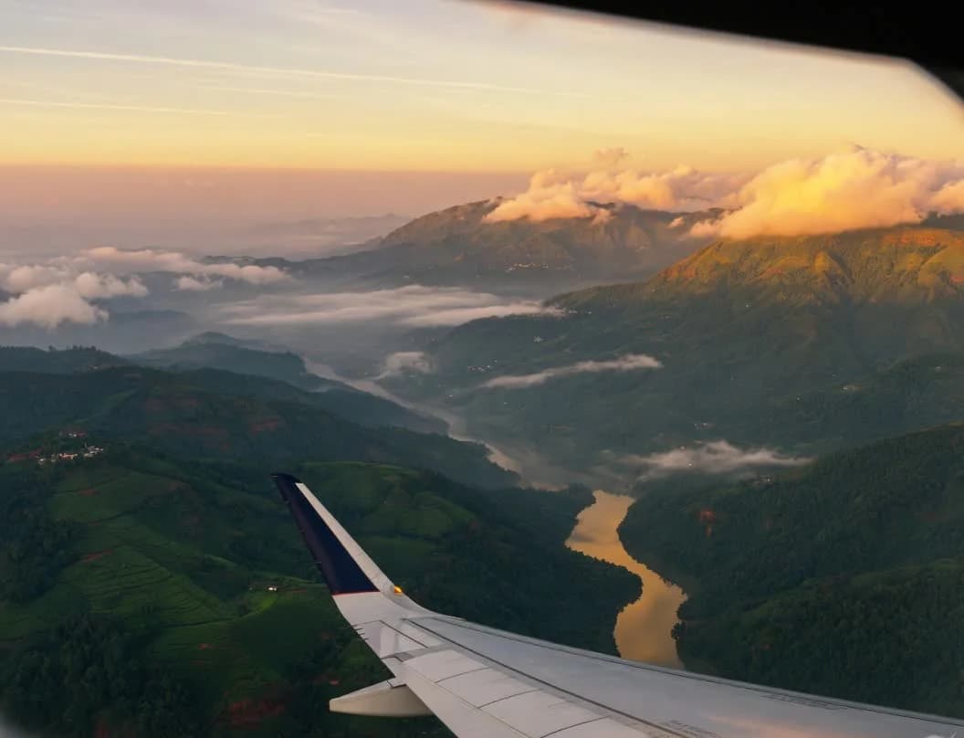 Aircraft wing over the Western Ghats at sunrise